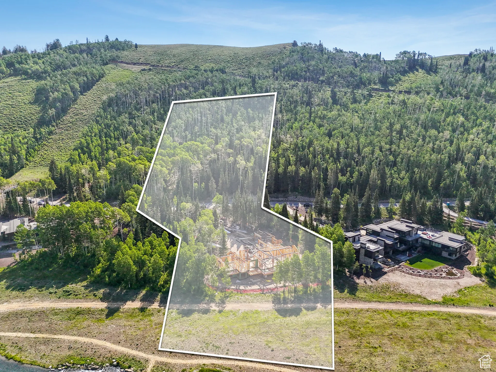 Aerial overview of property's location featuring property parcel outlined