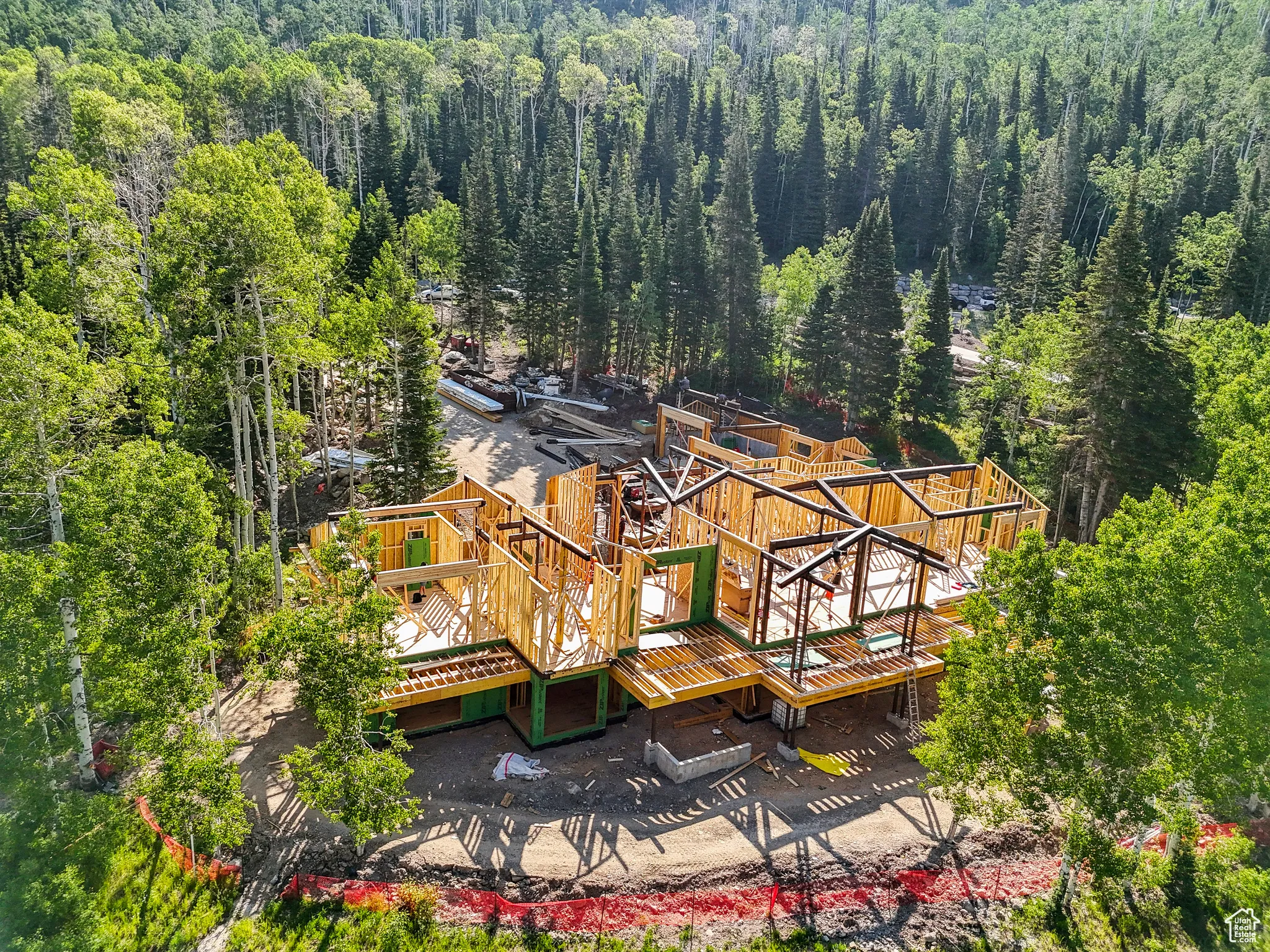 View of subject property featuring a heavily wooded area