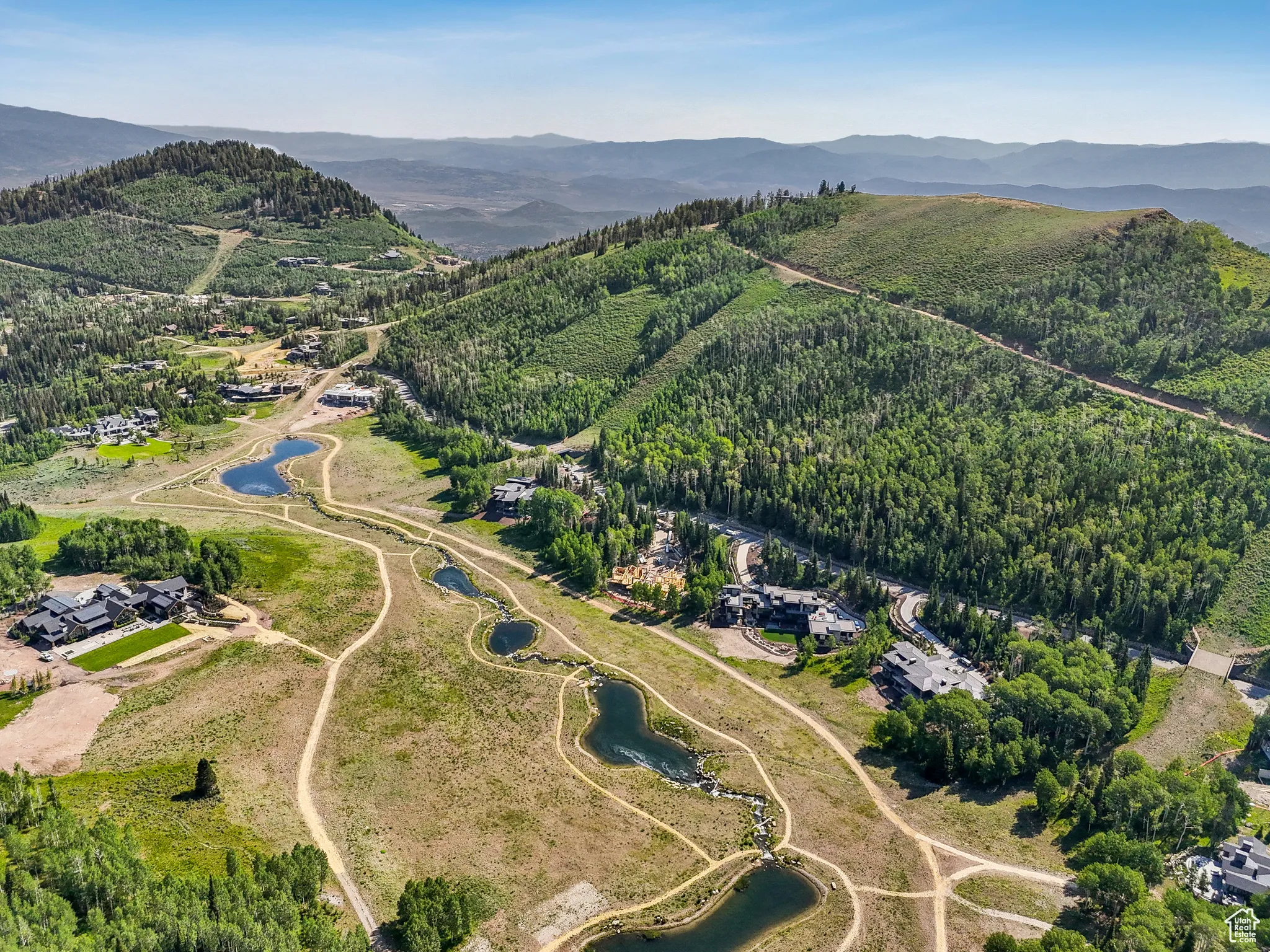 View of property location with a water and mountain view
