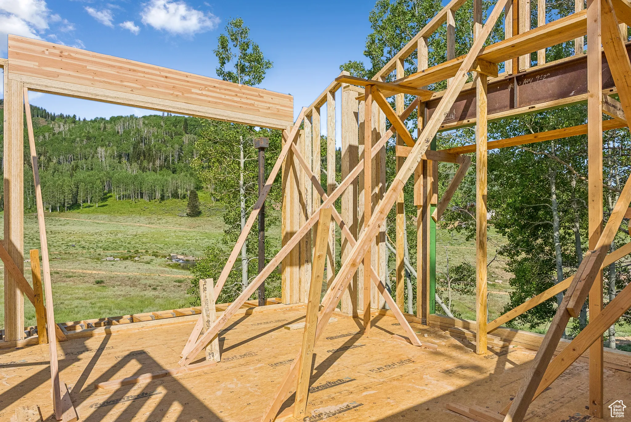 View of patio featuring a wooded view