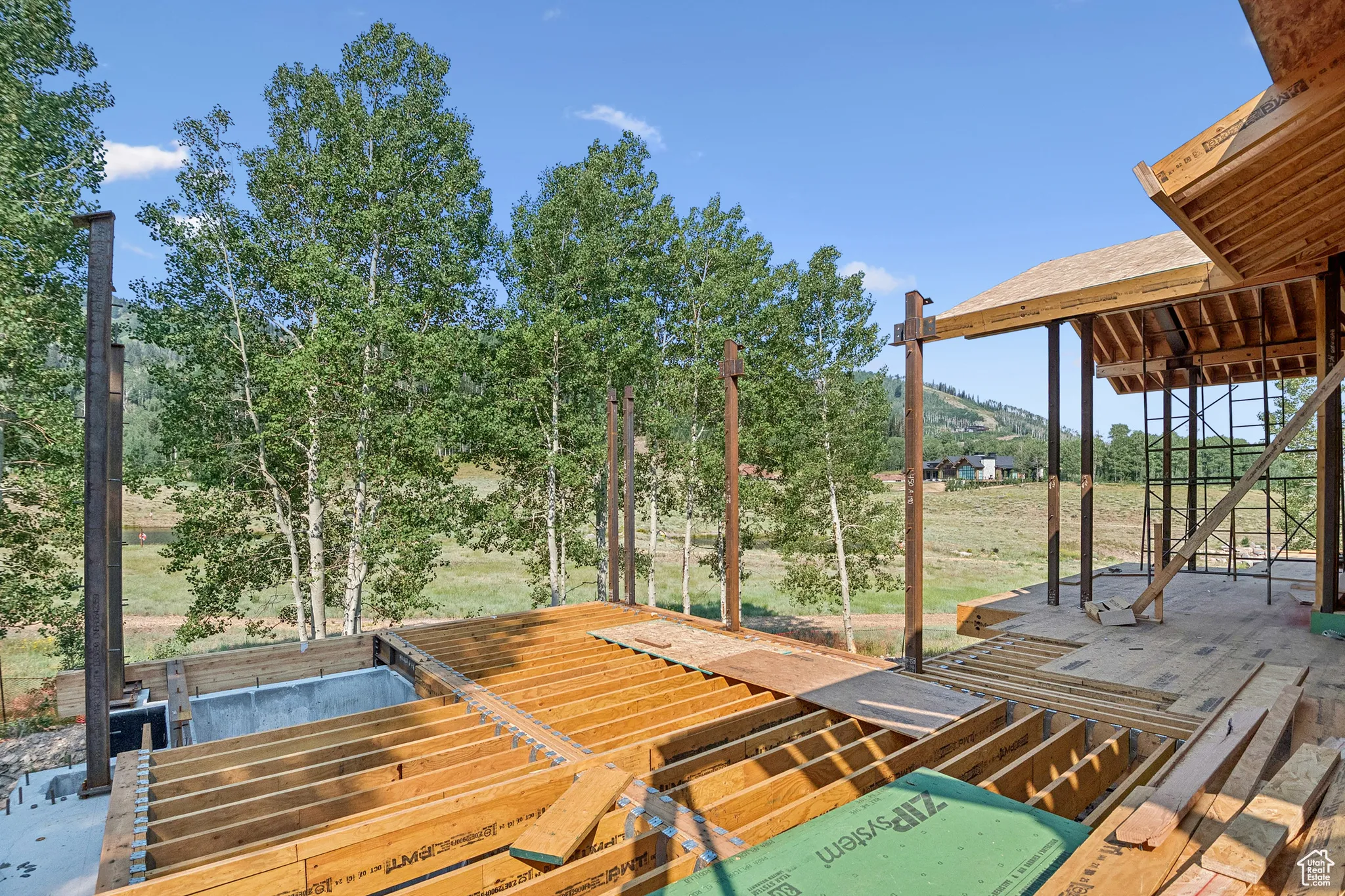 Wooden terrace featuring a mountain view