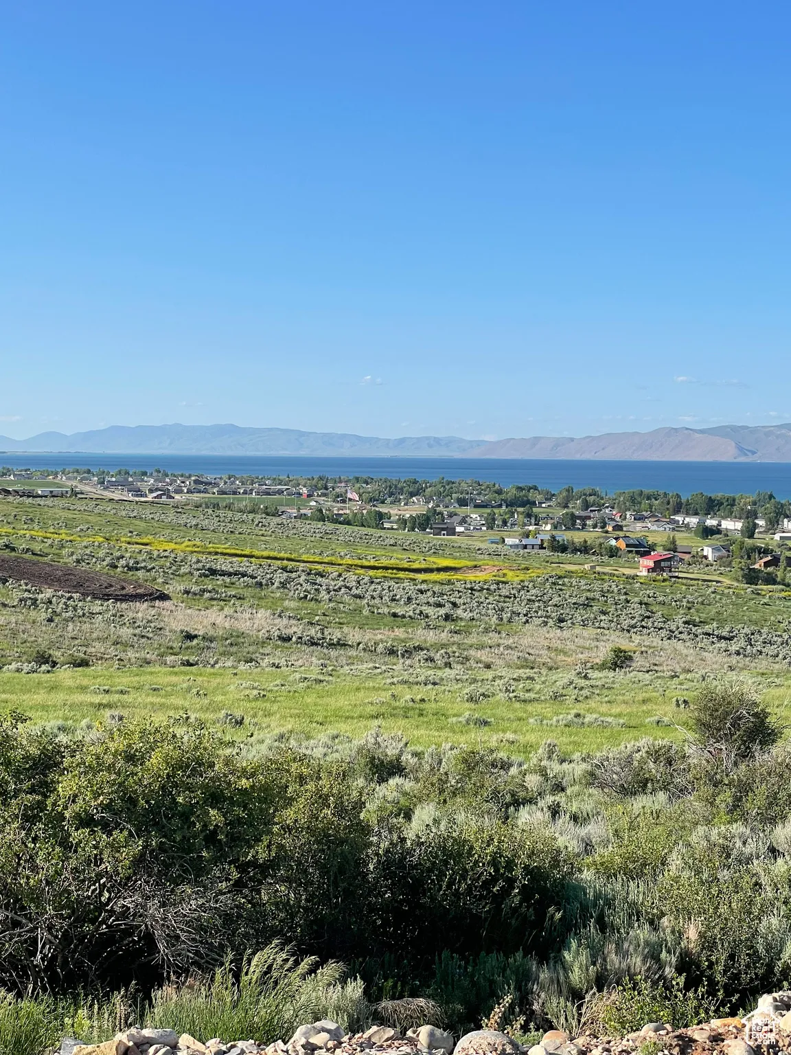 View of mountain background featuring rural landscape