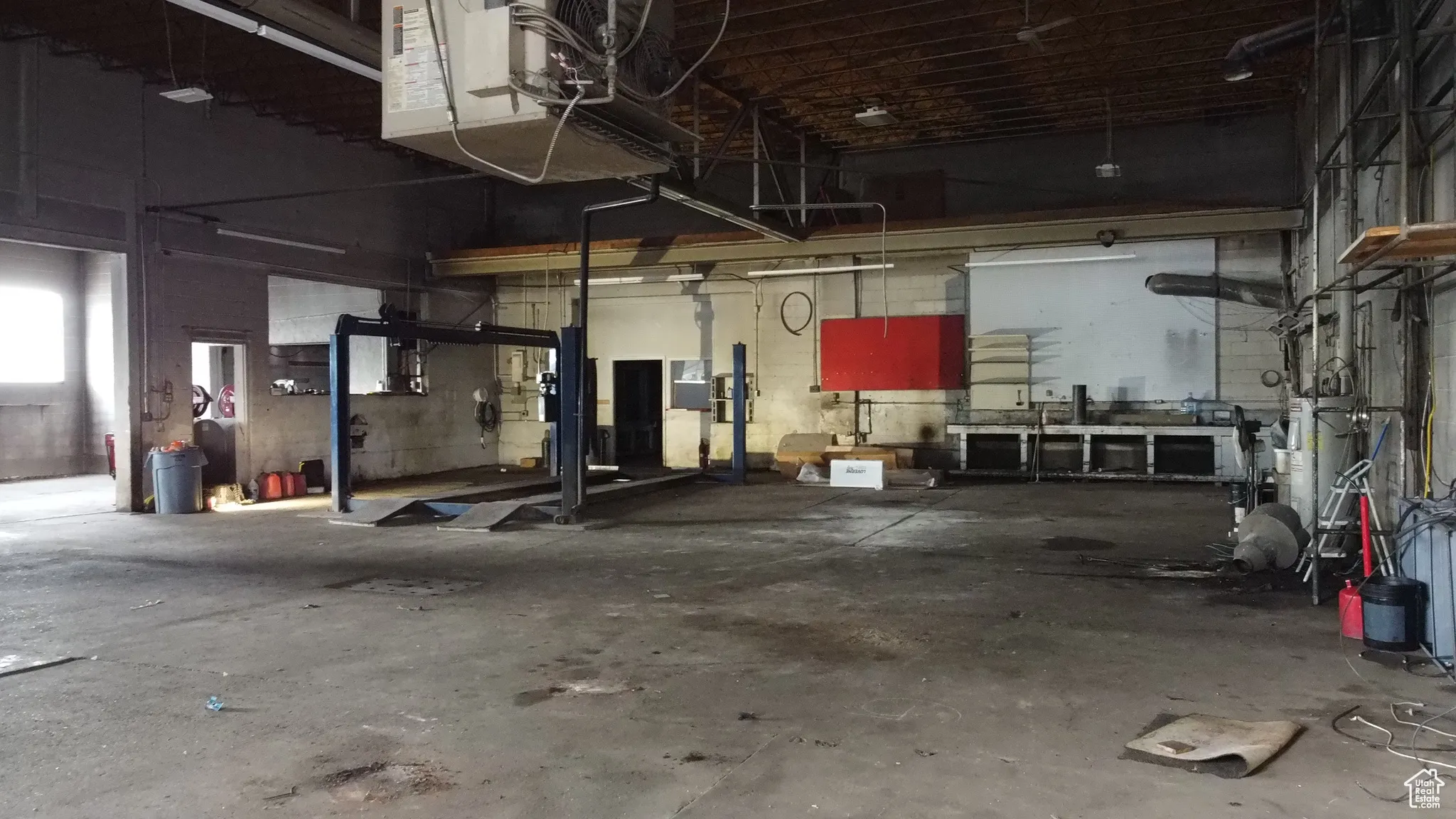 Garage featuring water heater