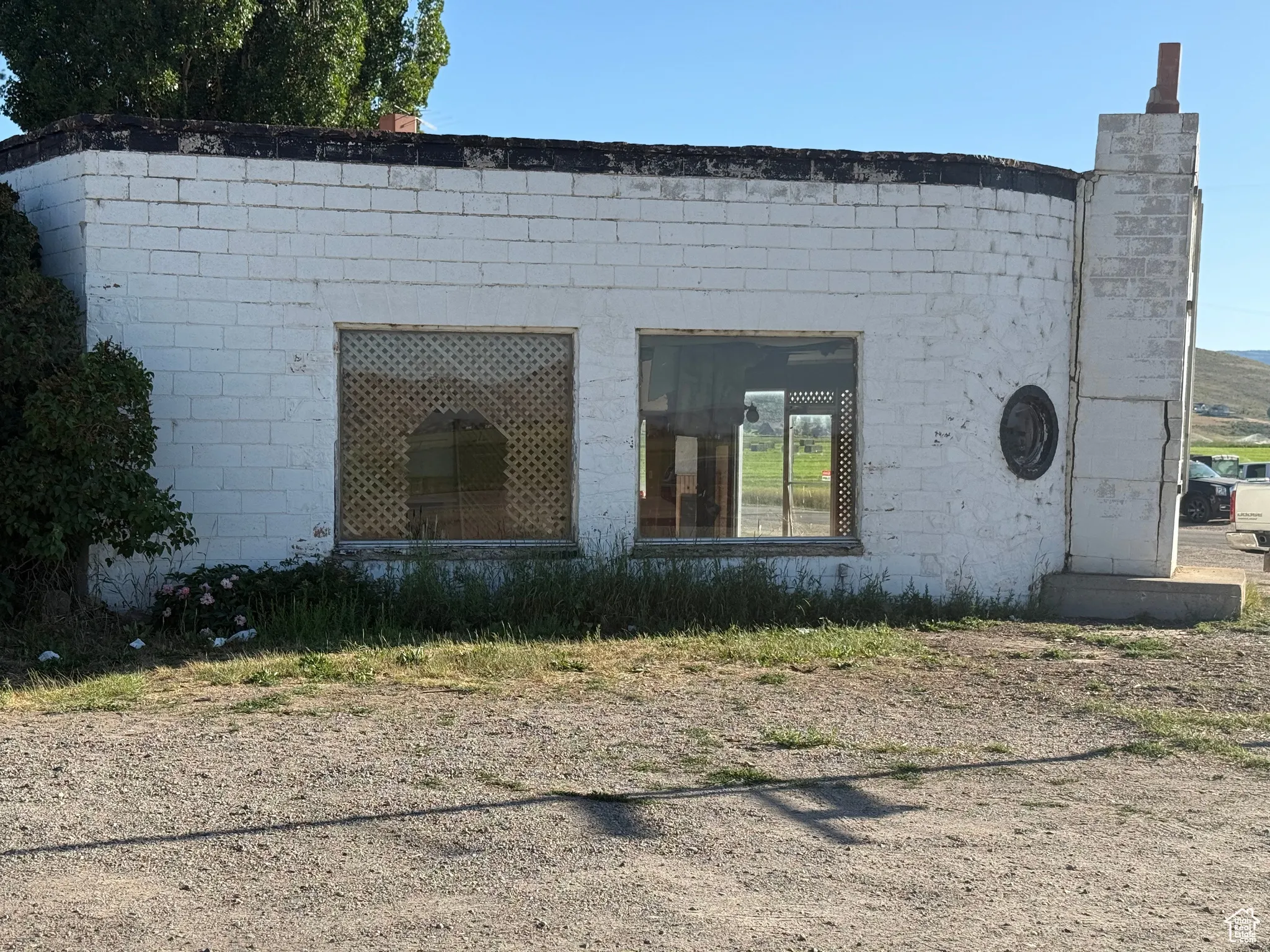 View of north side of property featuring a chimney