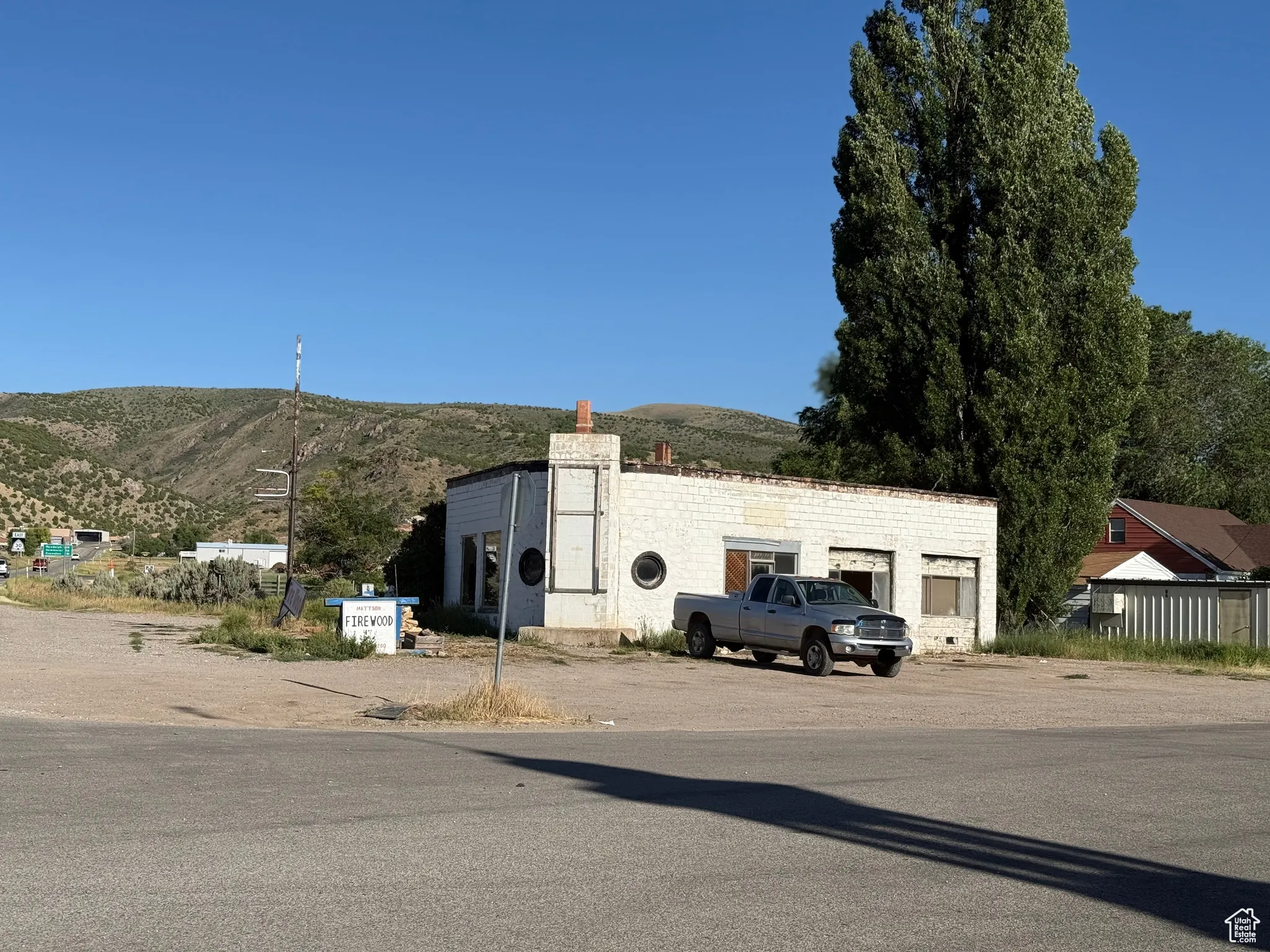 View of outbuilding with a mountain view