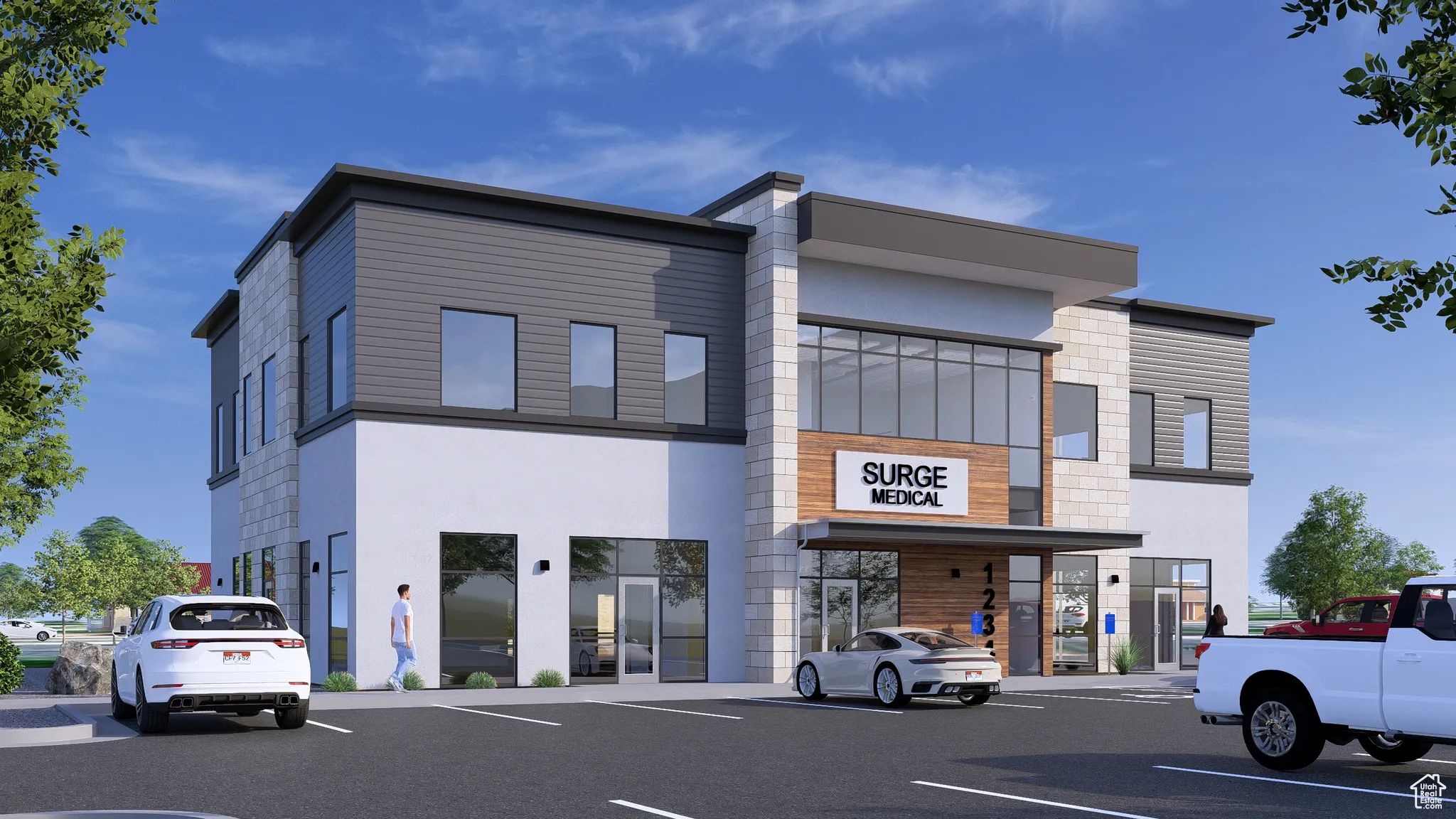 View of commercial location featuring uncovered parking
