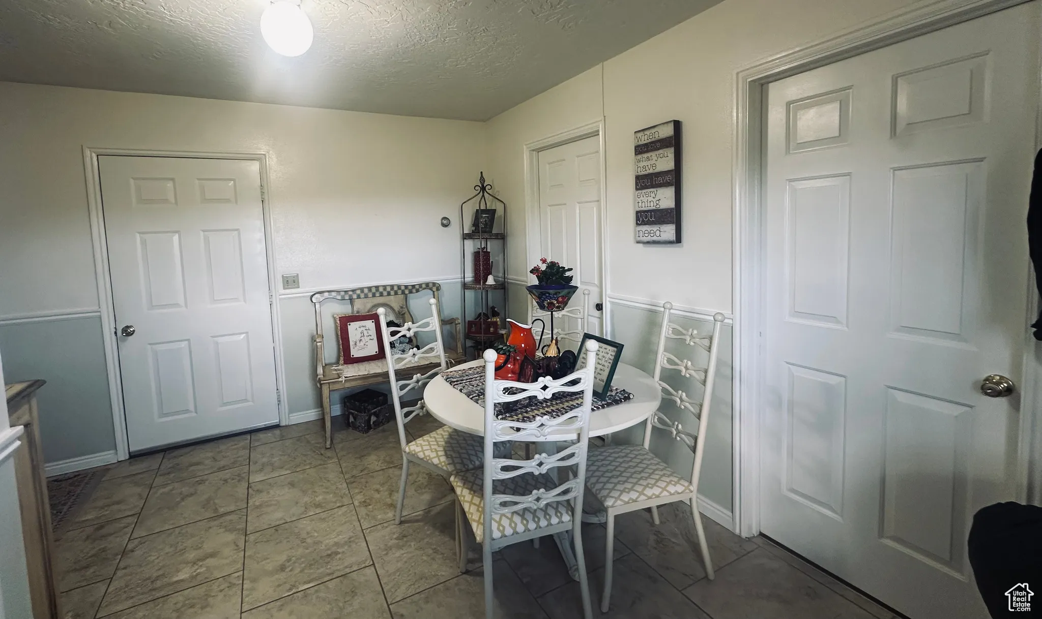 Dining space featuring a textured ceiling
