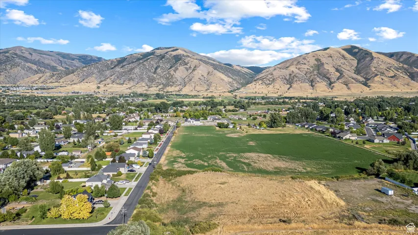 View of mountain background featuring nearby suburban area