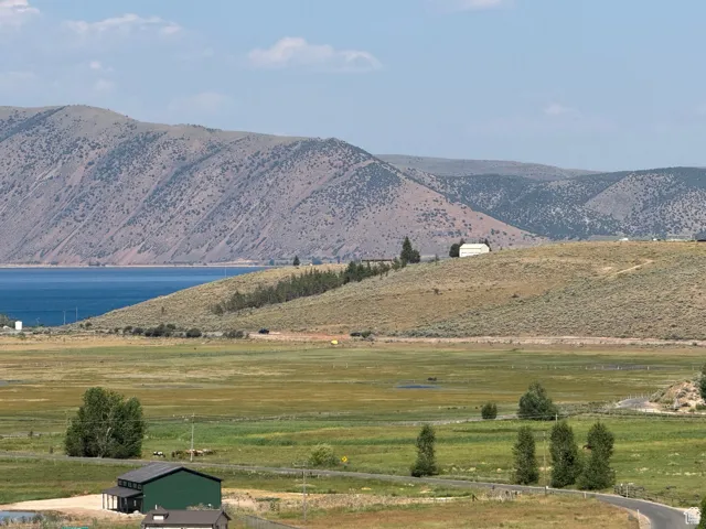 View of mountain backdrop with a large body of water