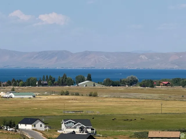 View of mountain backdrop featuring rural landscape