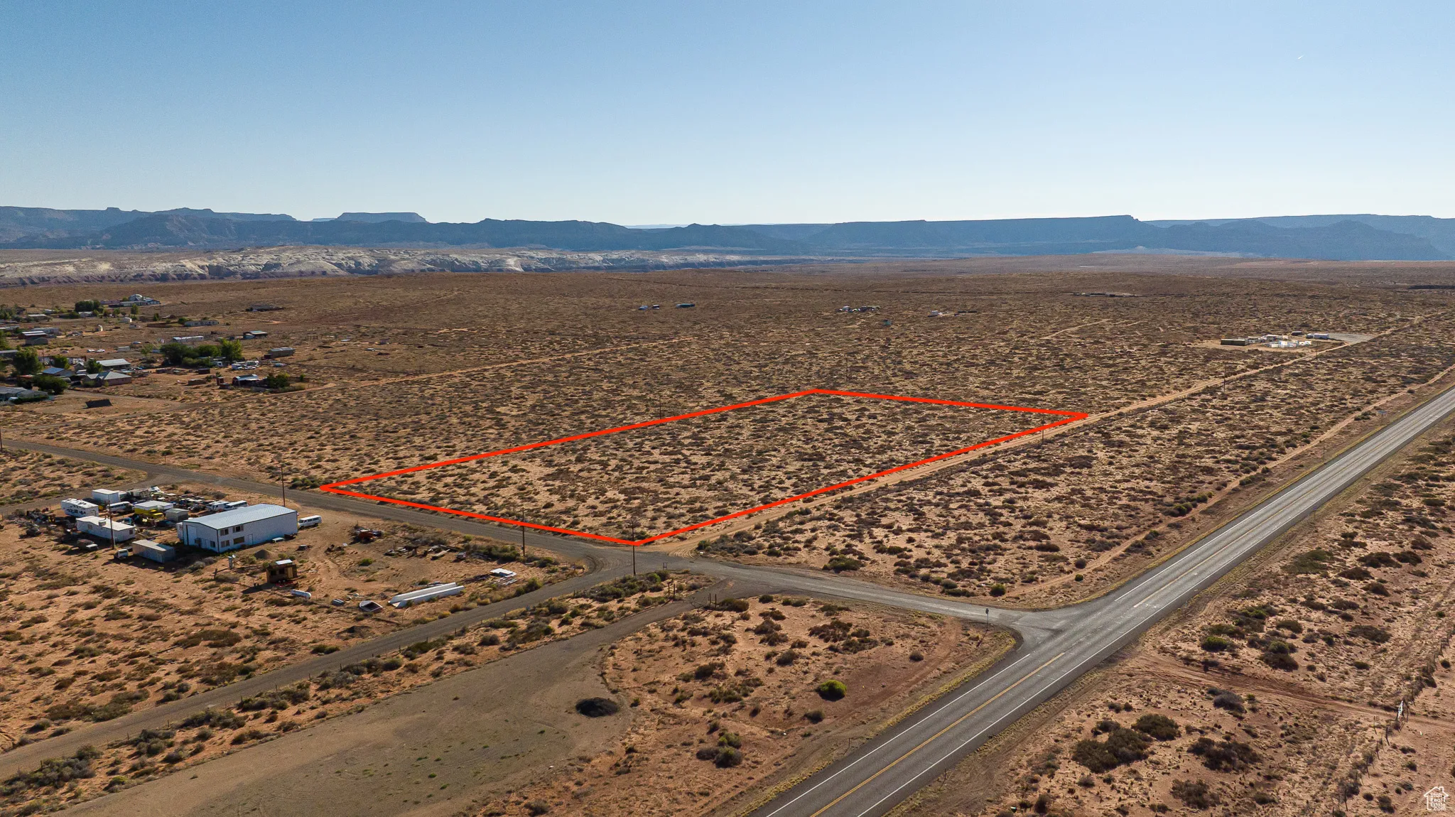 Overview of commercial property featuring mountains and property boundaries highlighted
