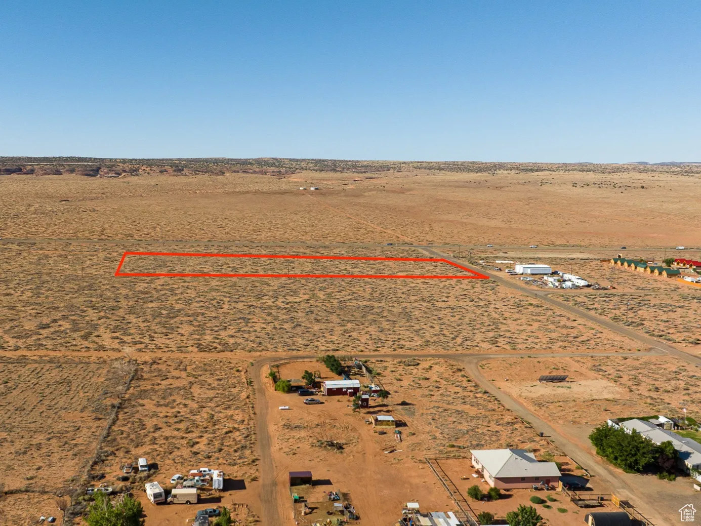 Overview of commercial property featuring mountains and property boundaries highlighted