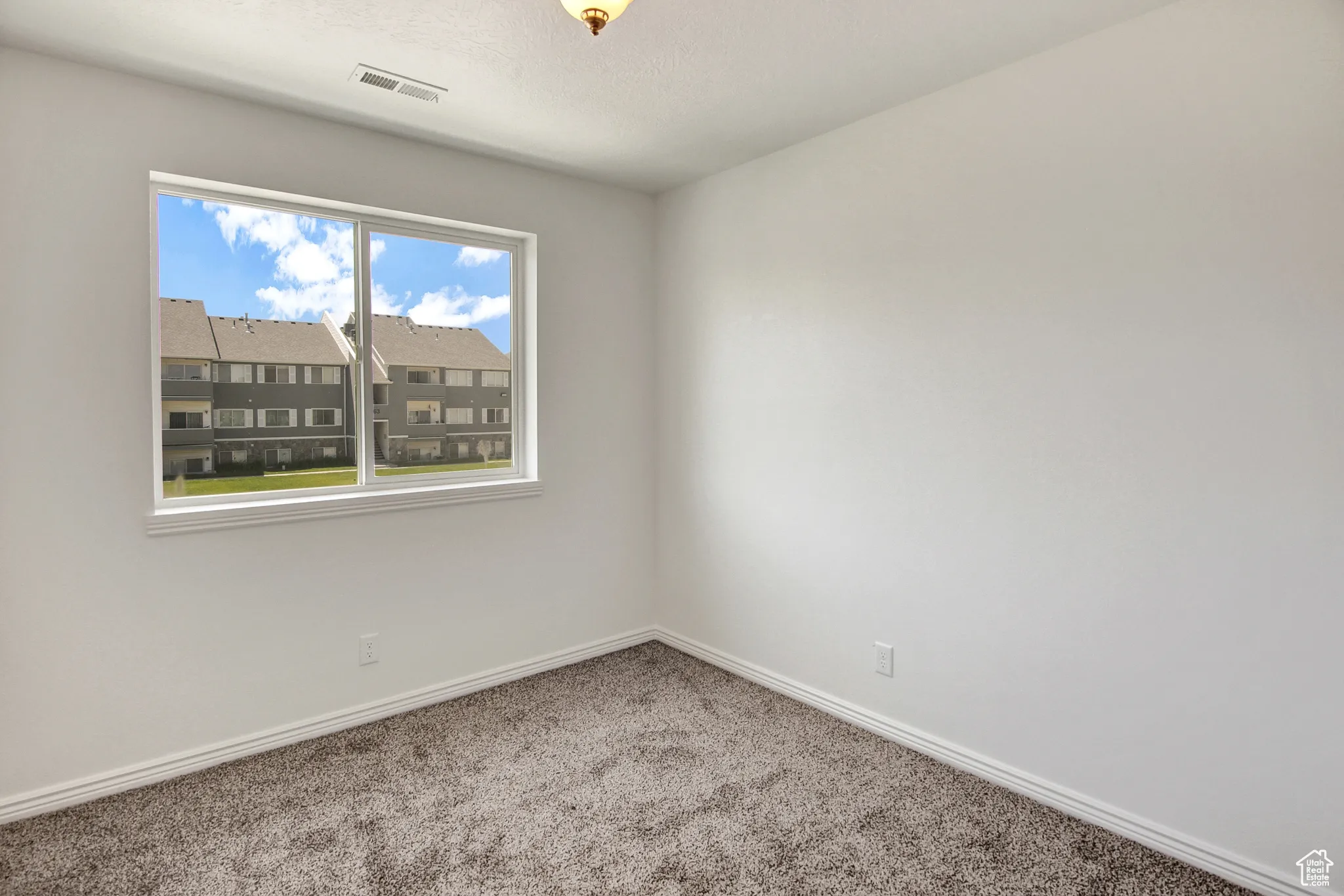 Third Bedroom with new paint & new carpet