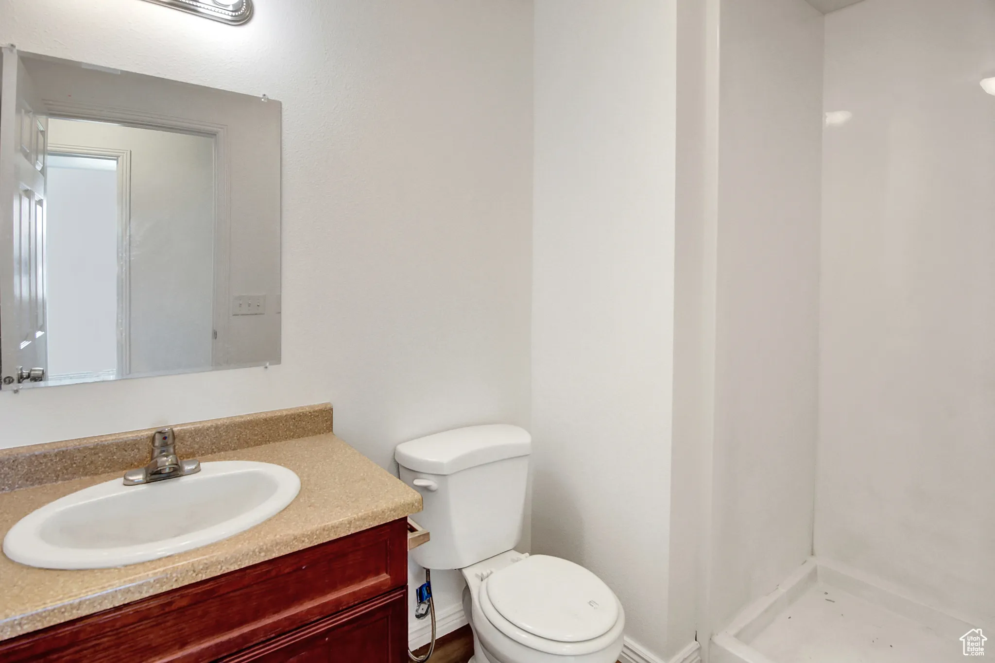 Main Bathroom with vanity & new paint & new LVP flooring