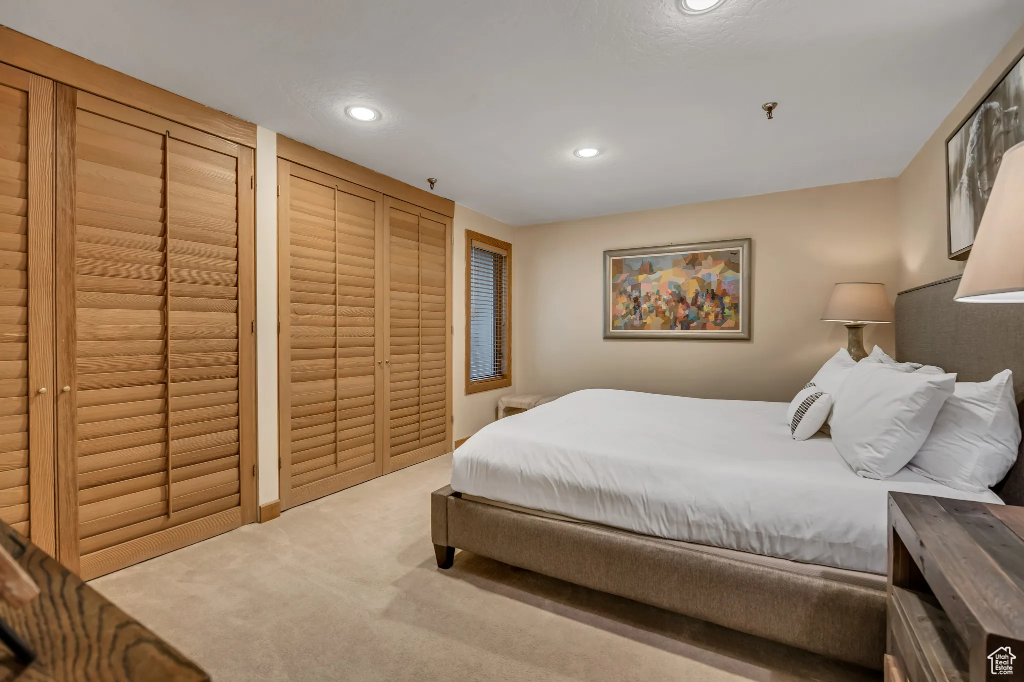 Carpeted bedroom featuring recessed lighting