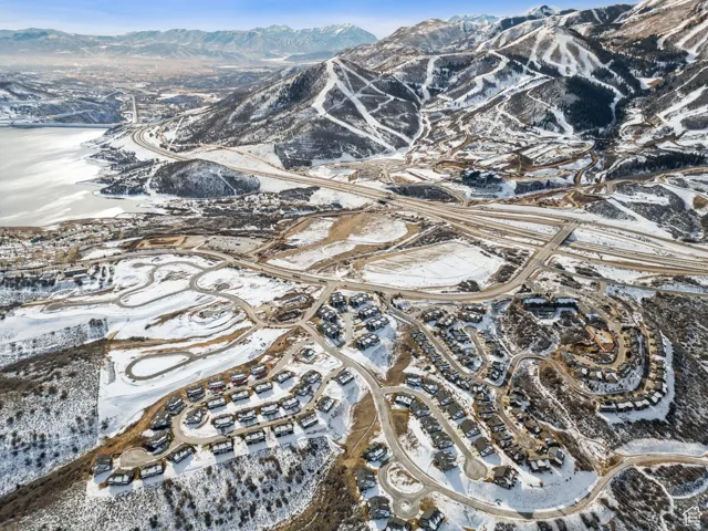 Snowy aerial view with a mountain view