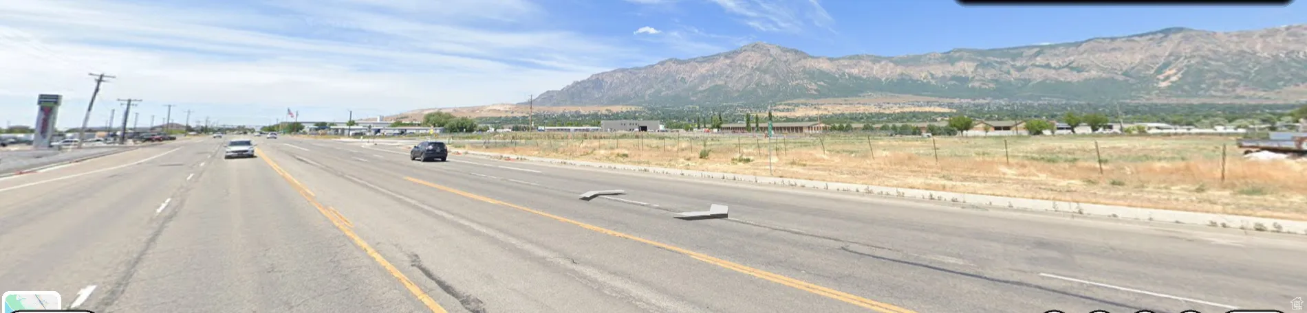 View of asphalt road featuring a mountain view
