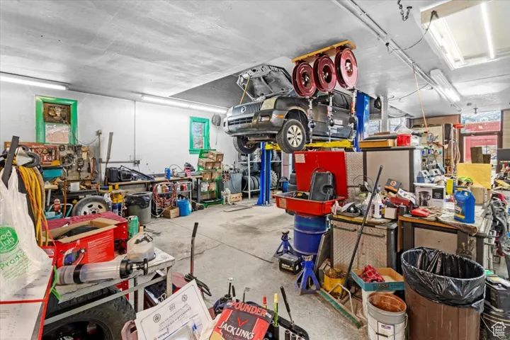 Garage featuring a workshop area