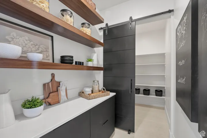 Washroom featuring a barn door