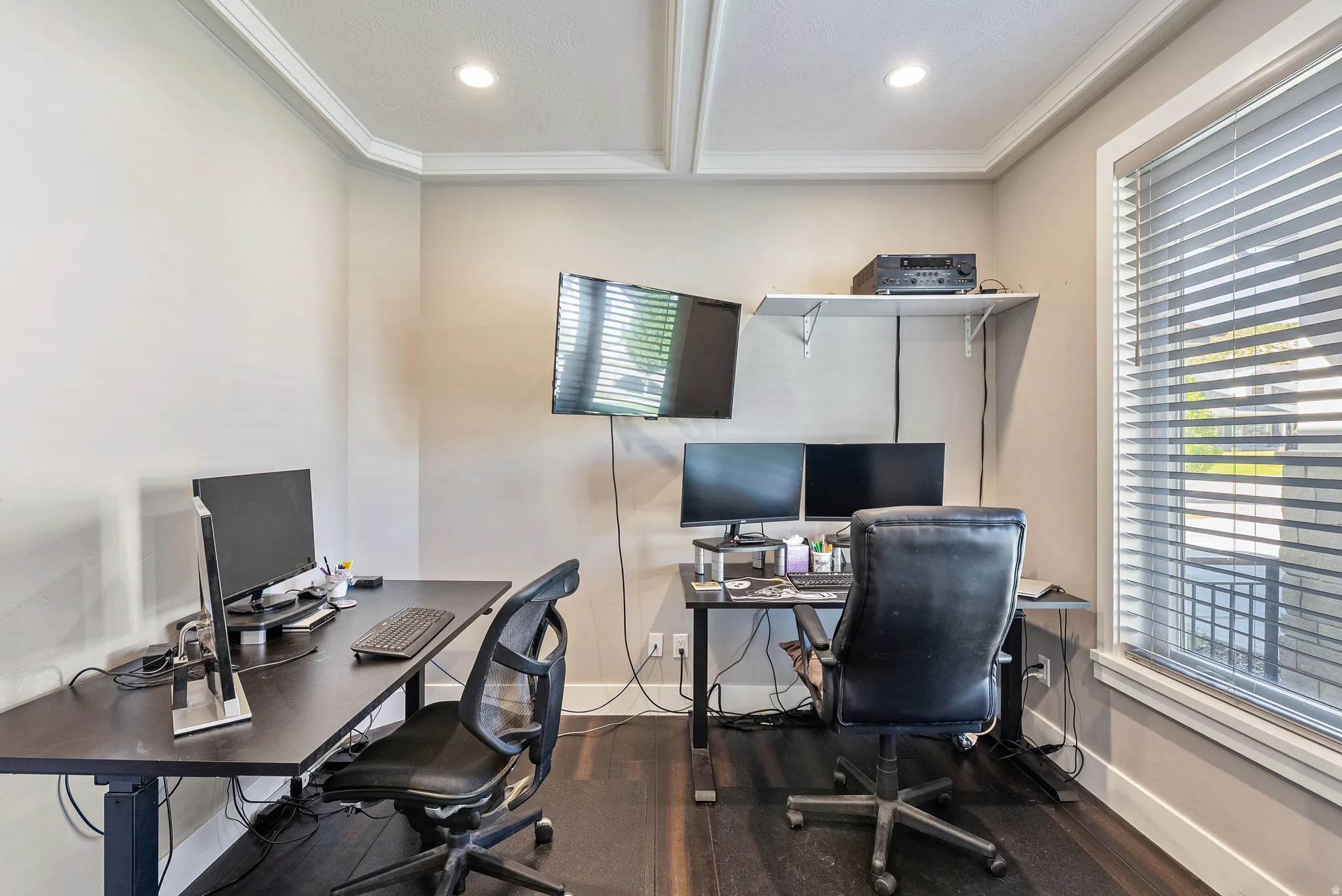Dedicated room featuring wood-finish flooring, recessed lighting, and crown molding