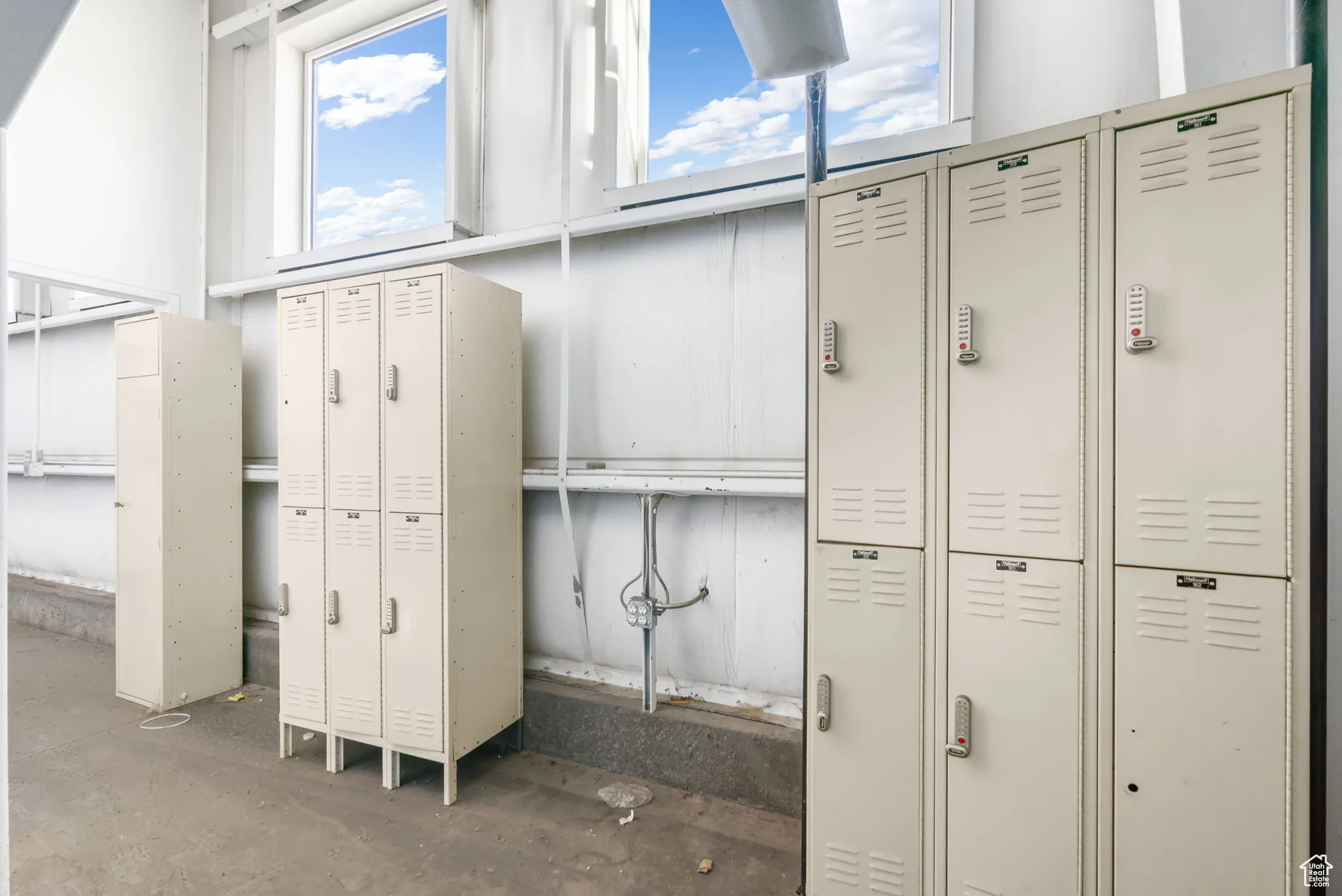 Interior space featuring plenty of natural light and a towering ceiling