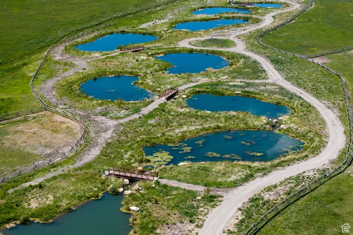 Aerial view of property's location featuring a nearby body of water
