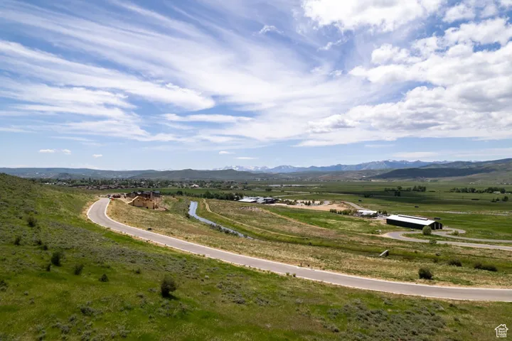 Aerial view of sparsely populated area featuring a mountain backdrop