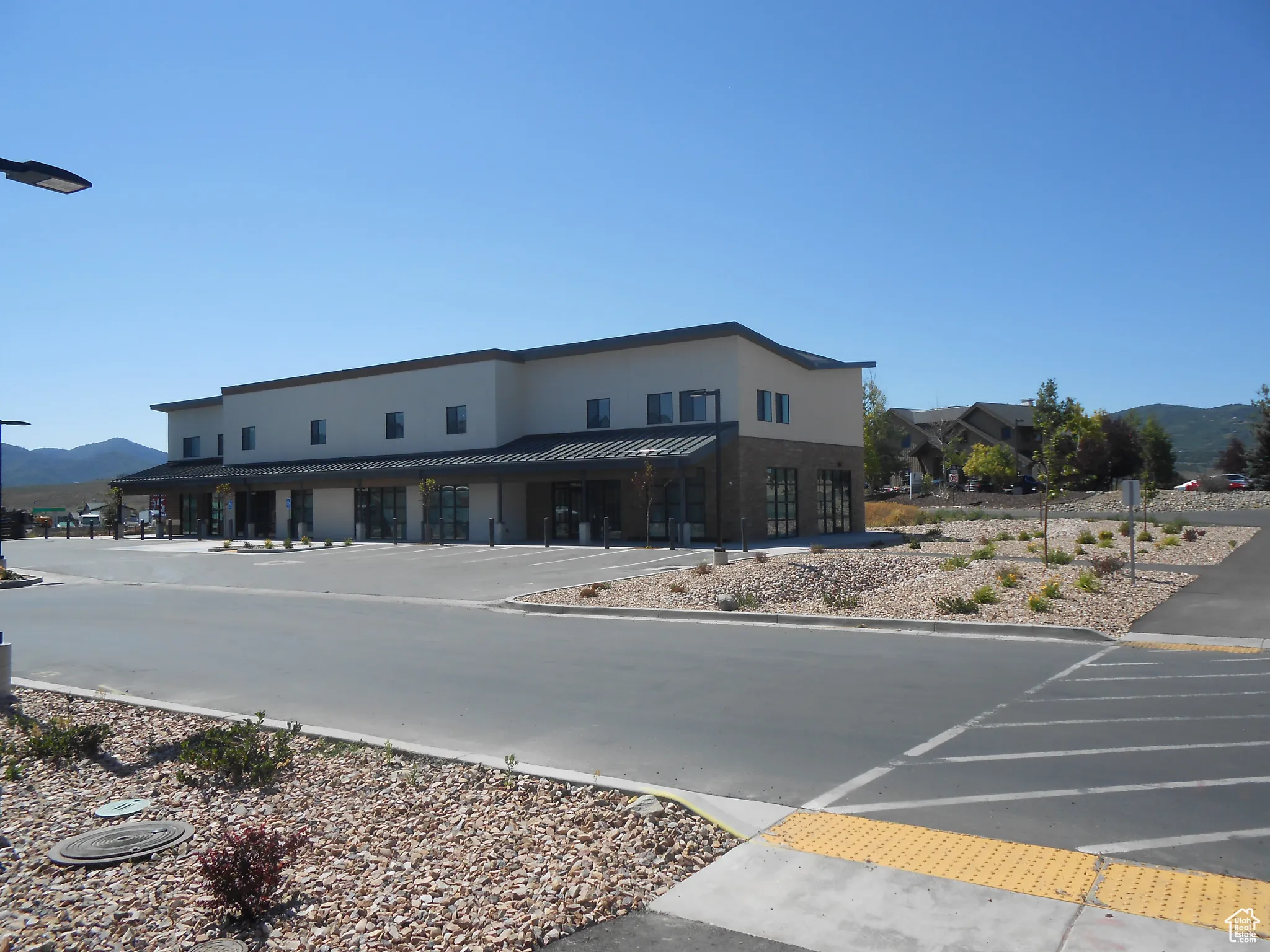 View of building exterior featuring a mountain view