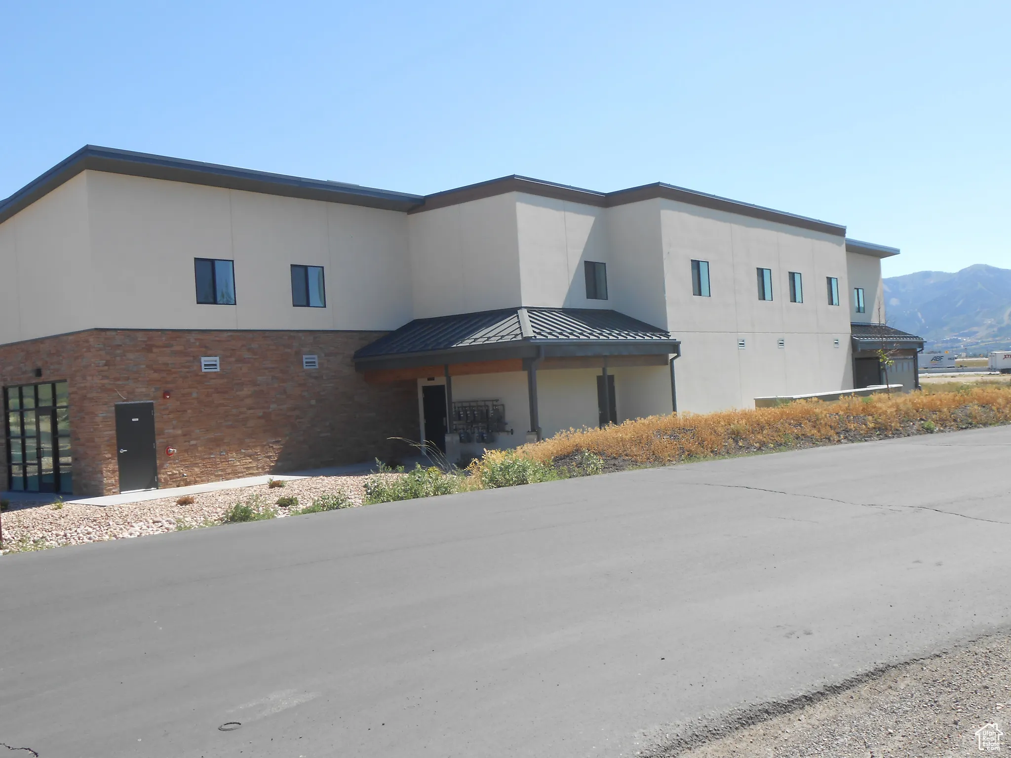 View of building exterior with a mountain view