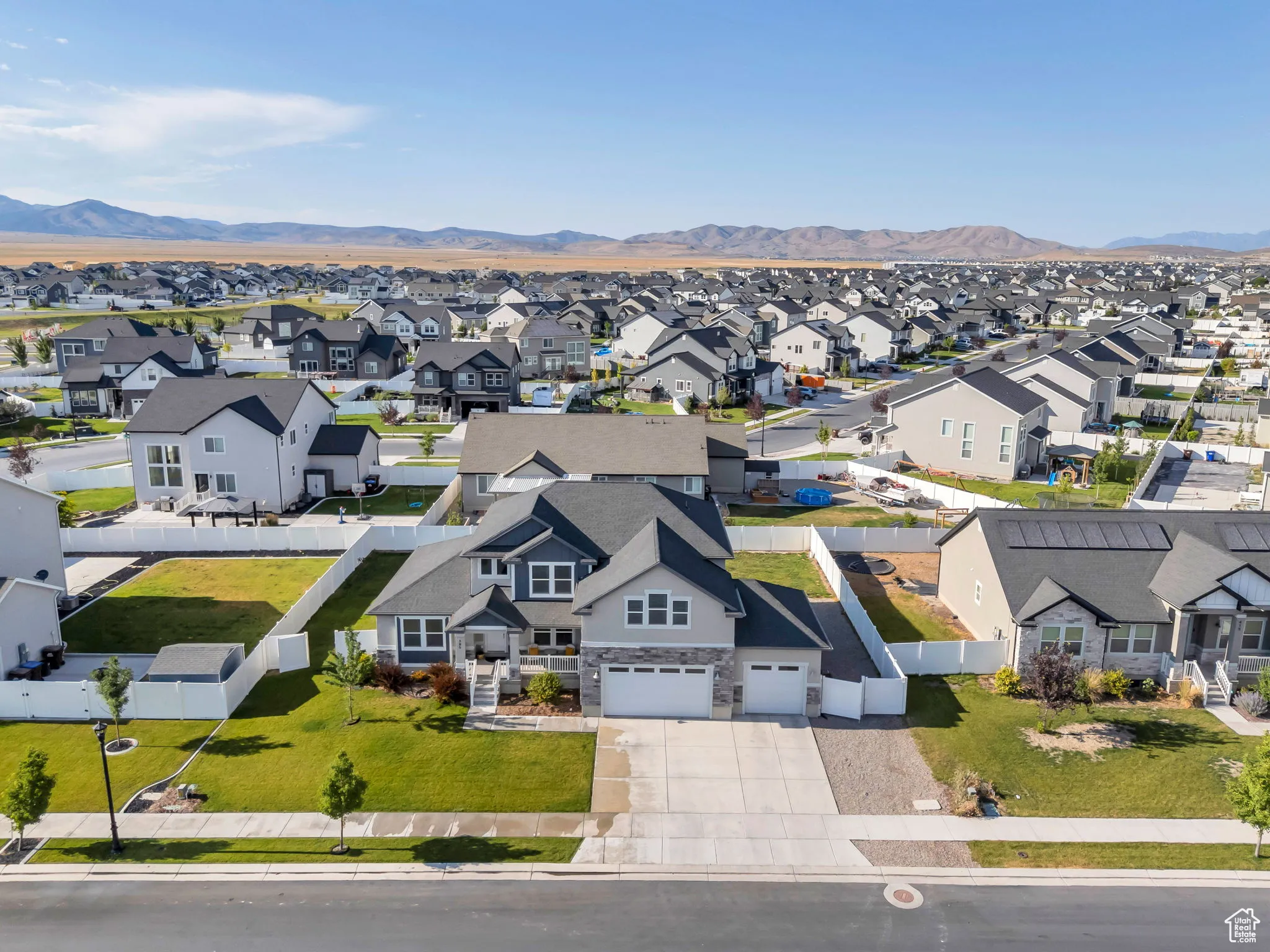 Aerial view of residential area with a mountain backdrop