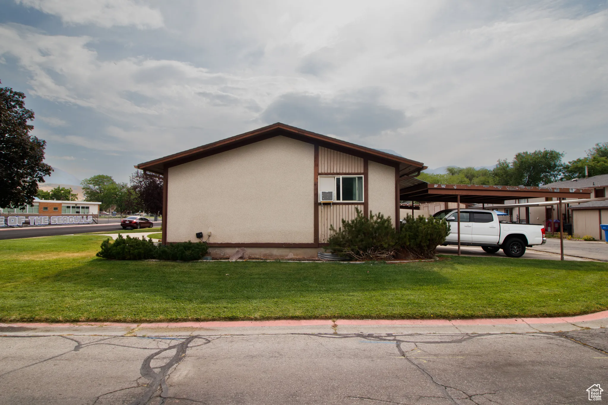 View of home's exterior with a lawn