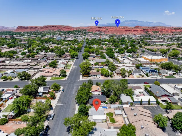 Aerial view of residential area with a mountainous background
