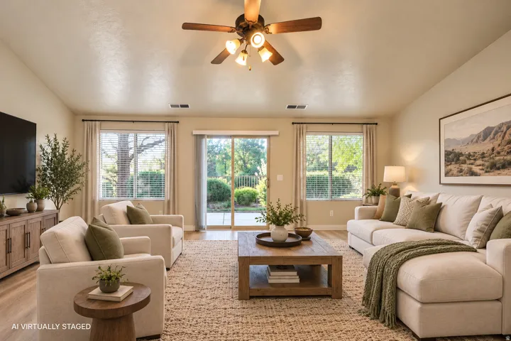 Vaulted ceiling with a ceiling fan, recessed lighting, wood-finish flooring, and sliding glass doors to the exterior