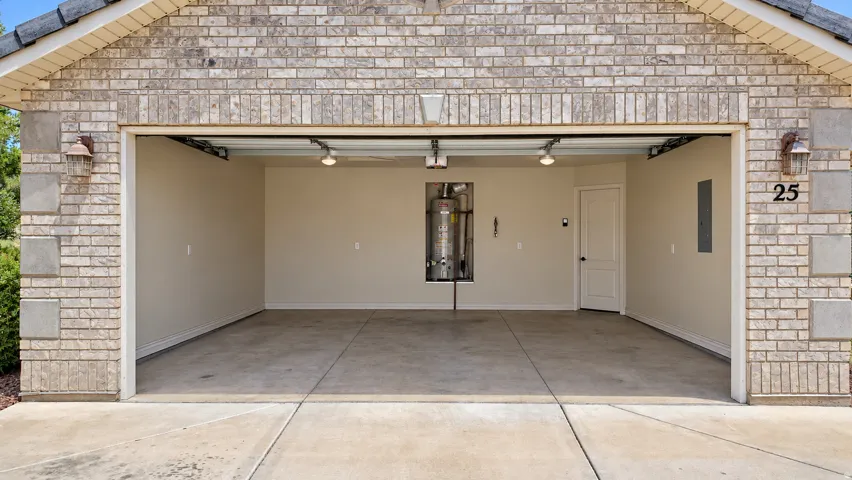 Brick and stone veneer exterior with sconce lighting