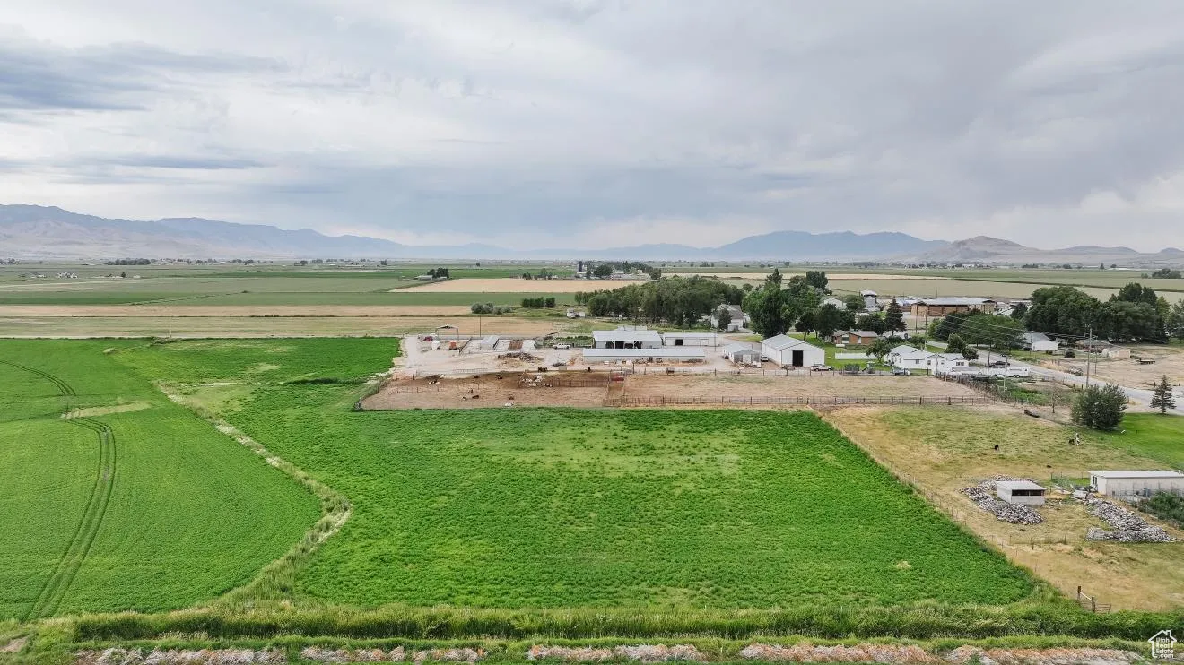 Aerial view of sparsely populated area with a mountainous background