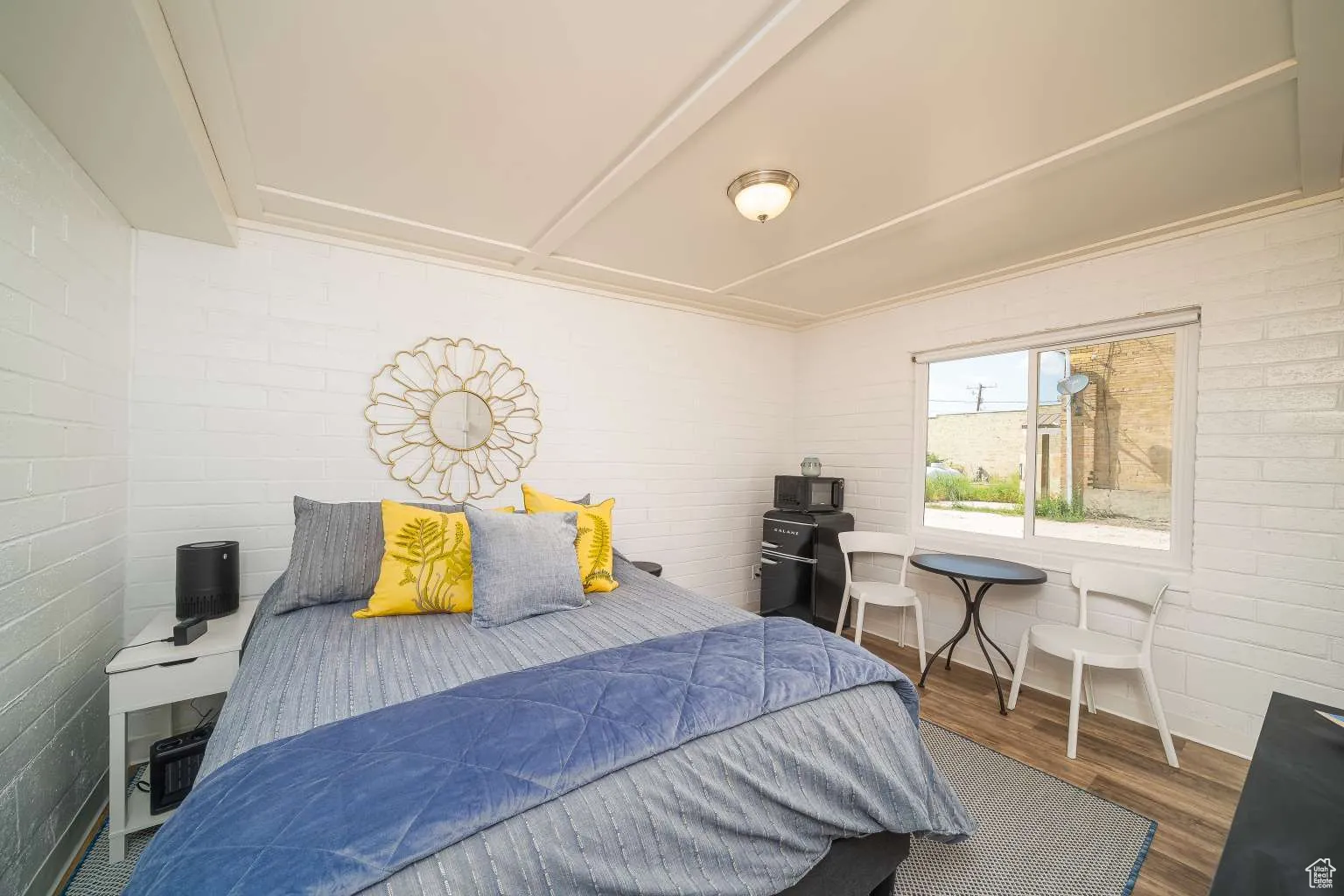 Bedroom featuring wood finished floors