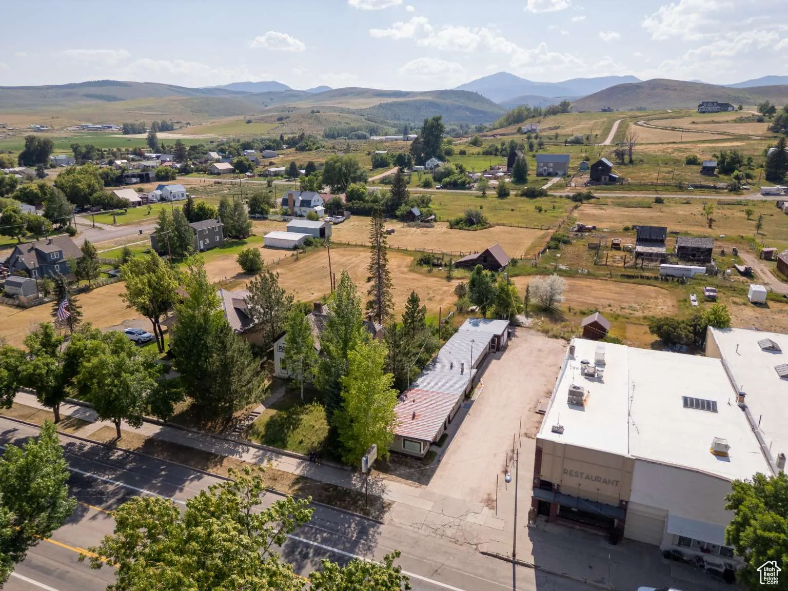 Aerial view of sparsely populated area with mountains