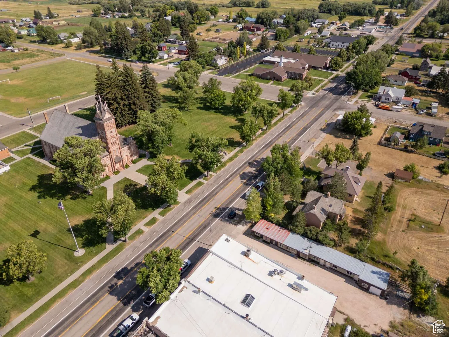 Aerial overview of property's location featuring nearby suburban area