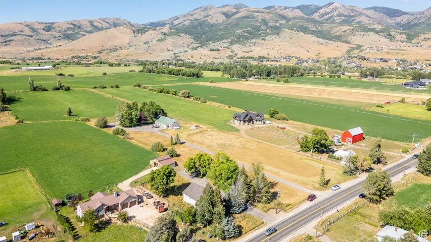 Aerial view of sparsely populated area featuring a mountainous background
