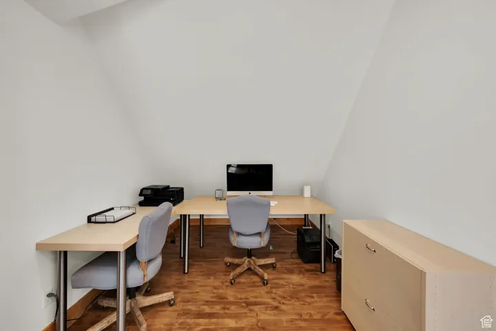 Office space with wood finished floors