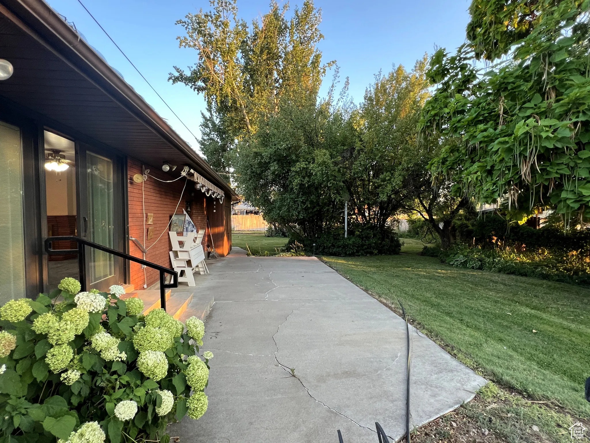 View of patio with retractable awning.