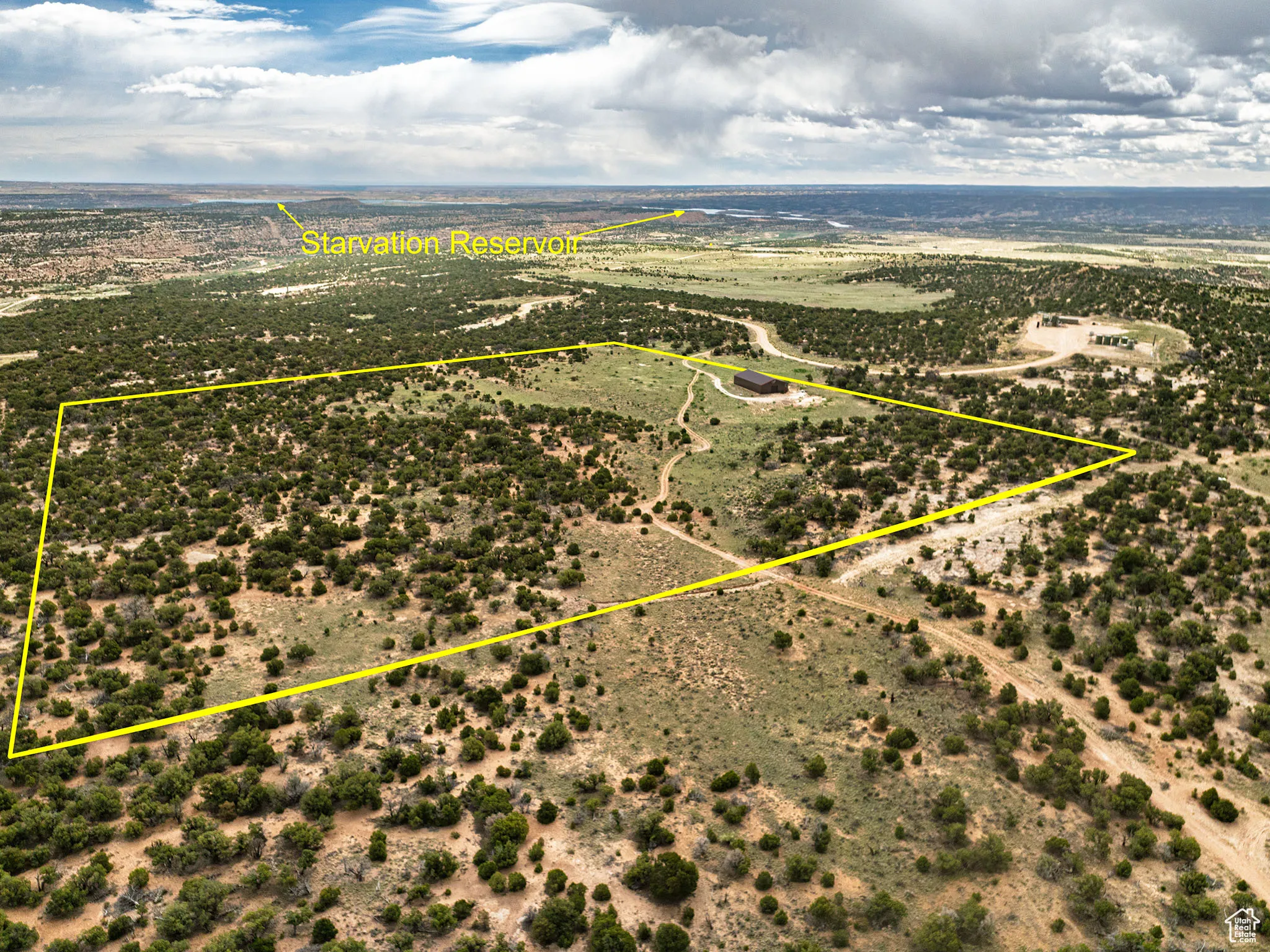 Overview of rural landscape with property parcel outlined