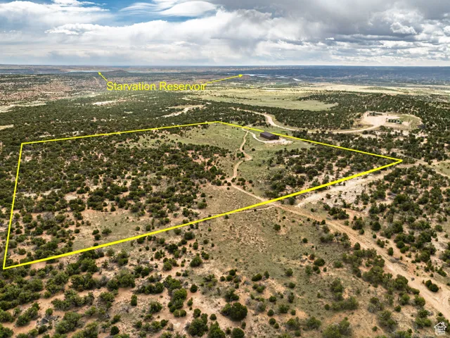 Overview of rural landscape with property parcel outlined