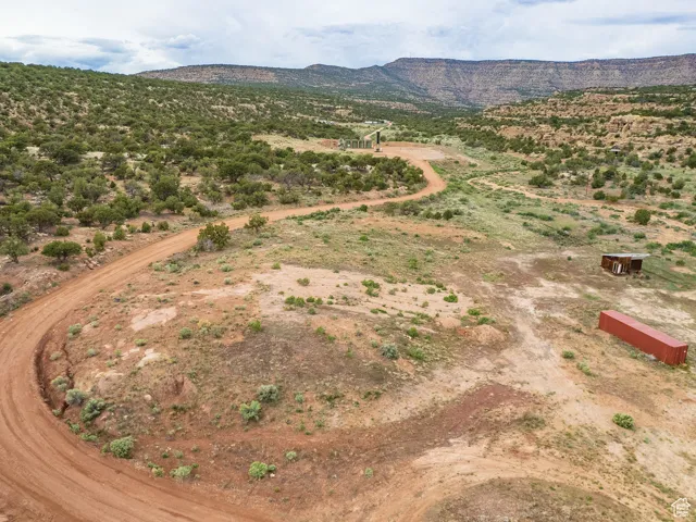 Overview of rural landscape featuring a mountain backdrop
