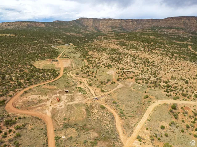 View of property location with a mountain backdrop and rural landscape