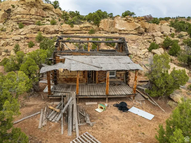 Rear view of property featuring a deck