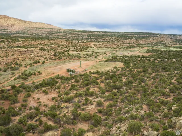 View of mountain background featuring rural landscape