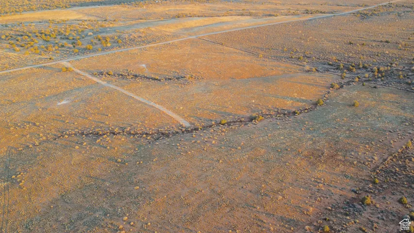 Aerial view of property and surrounding area featuring rural landscape