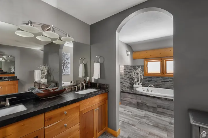 Bathroom featuring double vanity