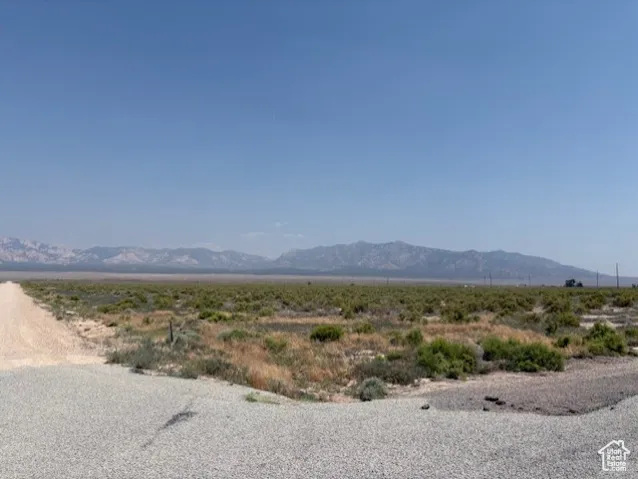 View of mountain background with rural landscape and a desert landscape